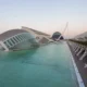 Ciudad de las Artes y las Ciencias de Valencia con el Hemisfèric y el Museu de les Ciències junto a la lámina de agua de la meta del maratón